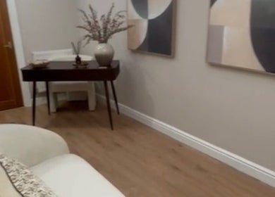 Contemporary decor at Mia's Beauty Room in Poole, England, GB. Elegant table and abstract wall art.