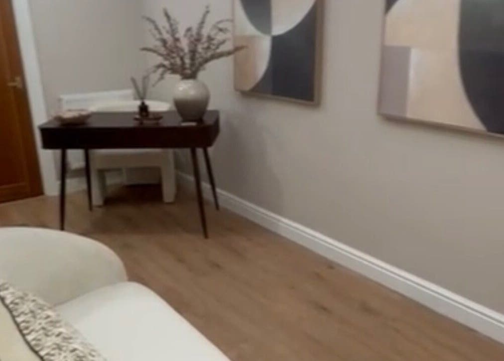 Contemporary decor at Mia's Beauty Room in Poole, England, GB. Elegant table and abstract wall art.