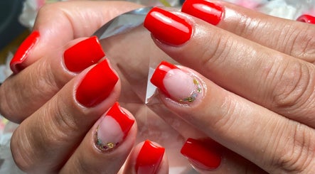 Vibrant red manicure at Michelli Santana Cabeleireiro e Estética, Lisboa, Lisboa, PT.