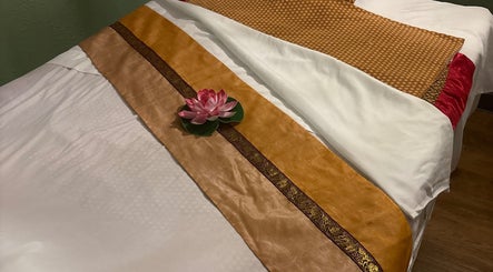 Tranquil massage bed with lotus at Thai Style Massage in San Diego, California, US.