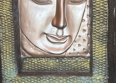 Intricate Buddha sculpture at Thai Style Massage, San Diego, California, US.