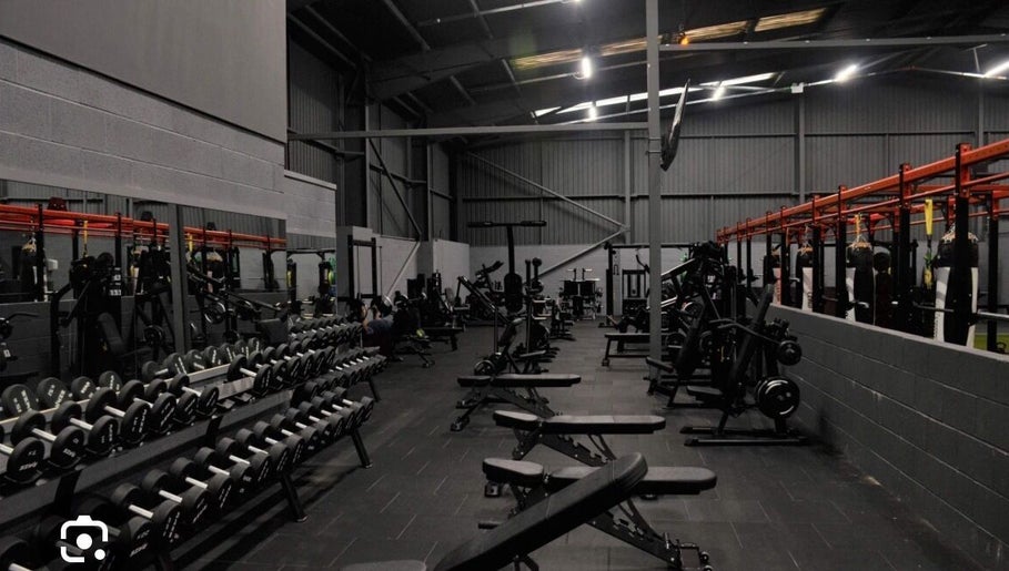 Modern gym at MK Coaching in Halfway, England, GB, featuring state-of-the-art equipment and spacious layout.