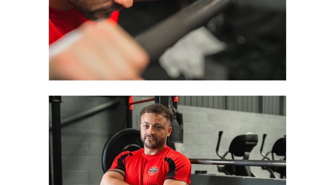 A fitness coach at MK Coaching, Halfway, England, GB, focusing on strength training equipment.