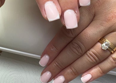 French manicure on neatly polished nails at Createdbycarris, Lytham Saint Annes, England, GB.