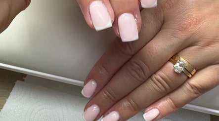 French manicure on neatly polished nails at Createdbycarris, Lytham Saint Annes, England, GB.