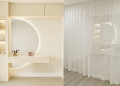 Chic makeup station at Maison Belissy in Toronto, Ontario, CA, featuring a backlit circular vanity and elegant decor.