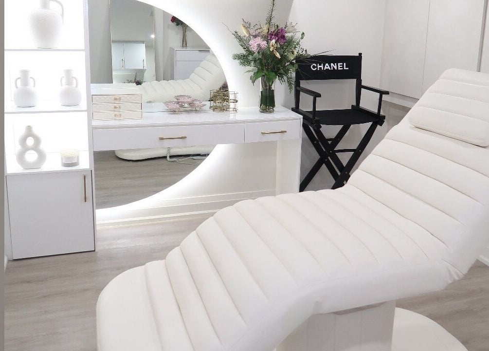 Luxury spa chair at Maison Belissy Beauty Salon x Nail Salon in Toronto, Ontario, CA, next to stylish decor.