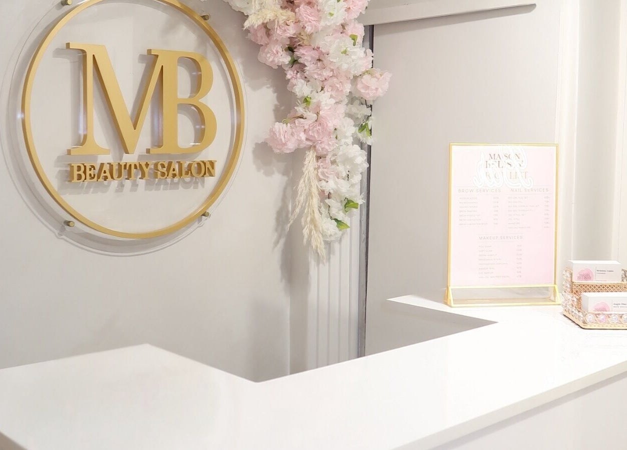 Reception area of Maison Belissy Beauty Salon x Nail Salon in Toronto, Ontario, CA with elegant floral decor.