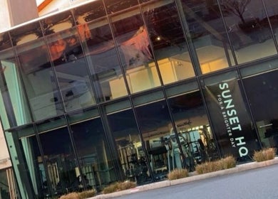 Exterior of Goldman Personal Training, a modern glass-front building in Richmond, British Columbia, CA.