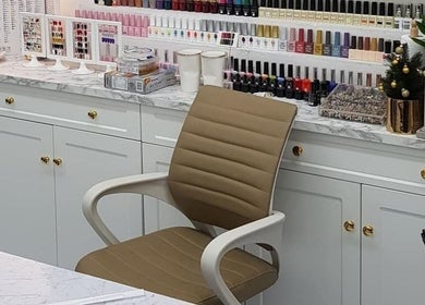 BuffNails nail polish collection display with cozy chair in Makkah, Makkah Province, SA.