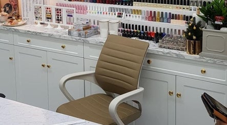BuffNails nail polish collection display with cozy chair in Makkah, Makkah Province, SA.