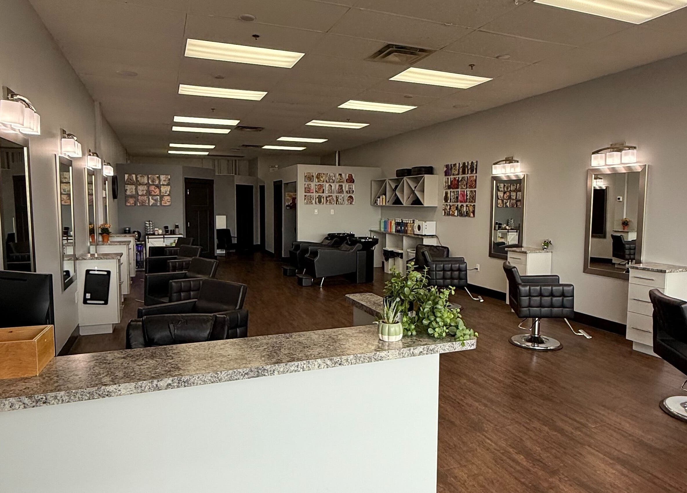 Spacious salon interior at Custom Hair Lounge, Courtenay, British Columbia, CA, featuring chic styling stations.