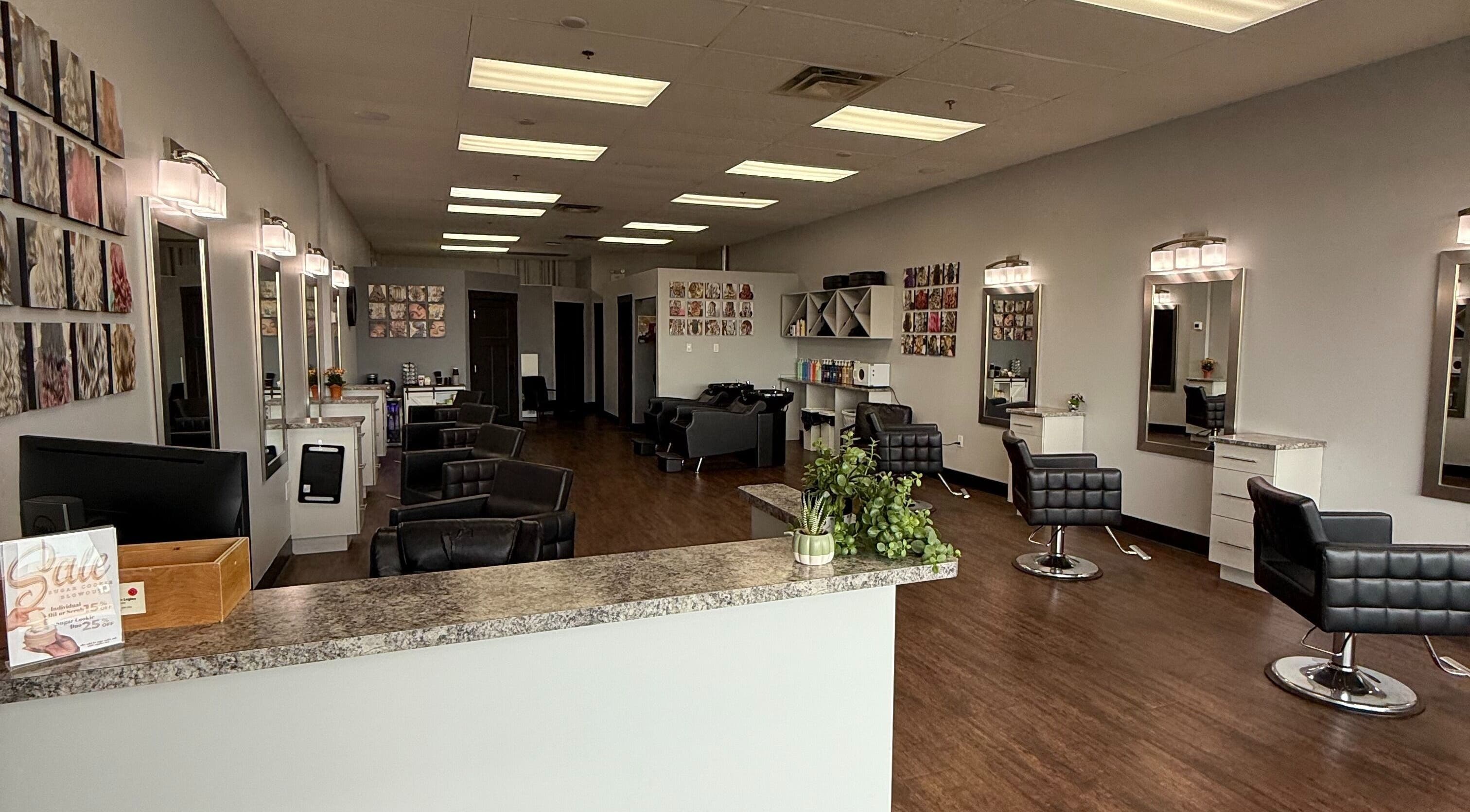 Spacious salon interior at Custom Hair Lounge, Courtenay, British Columbia, CA, featuring chic styling stations.