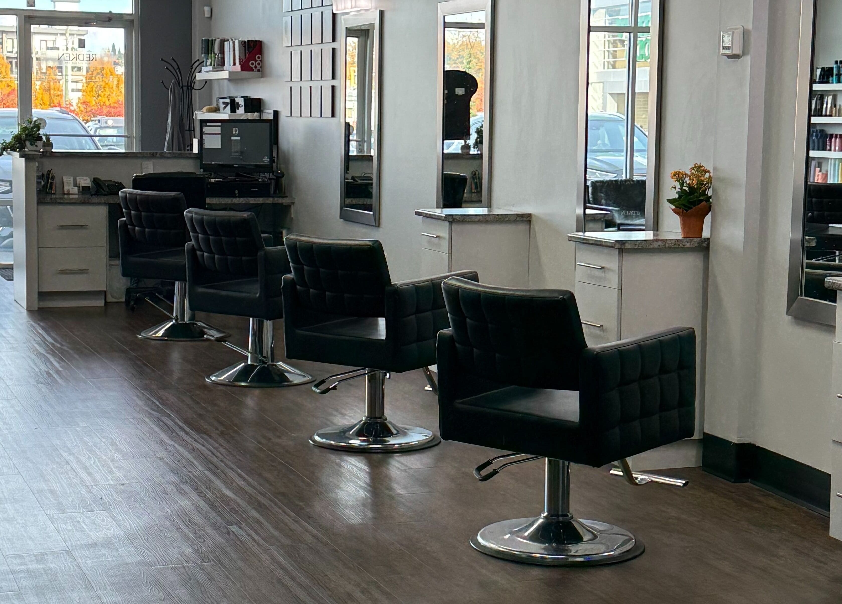 Modern salon chairs and mirrors at Custom Hair Lounge, Courtenay, BC, CA.