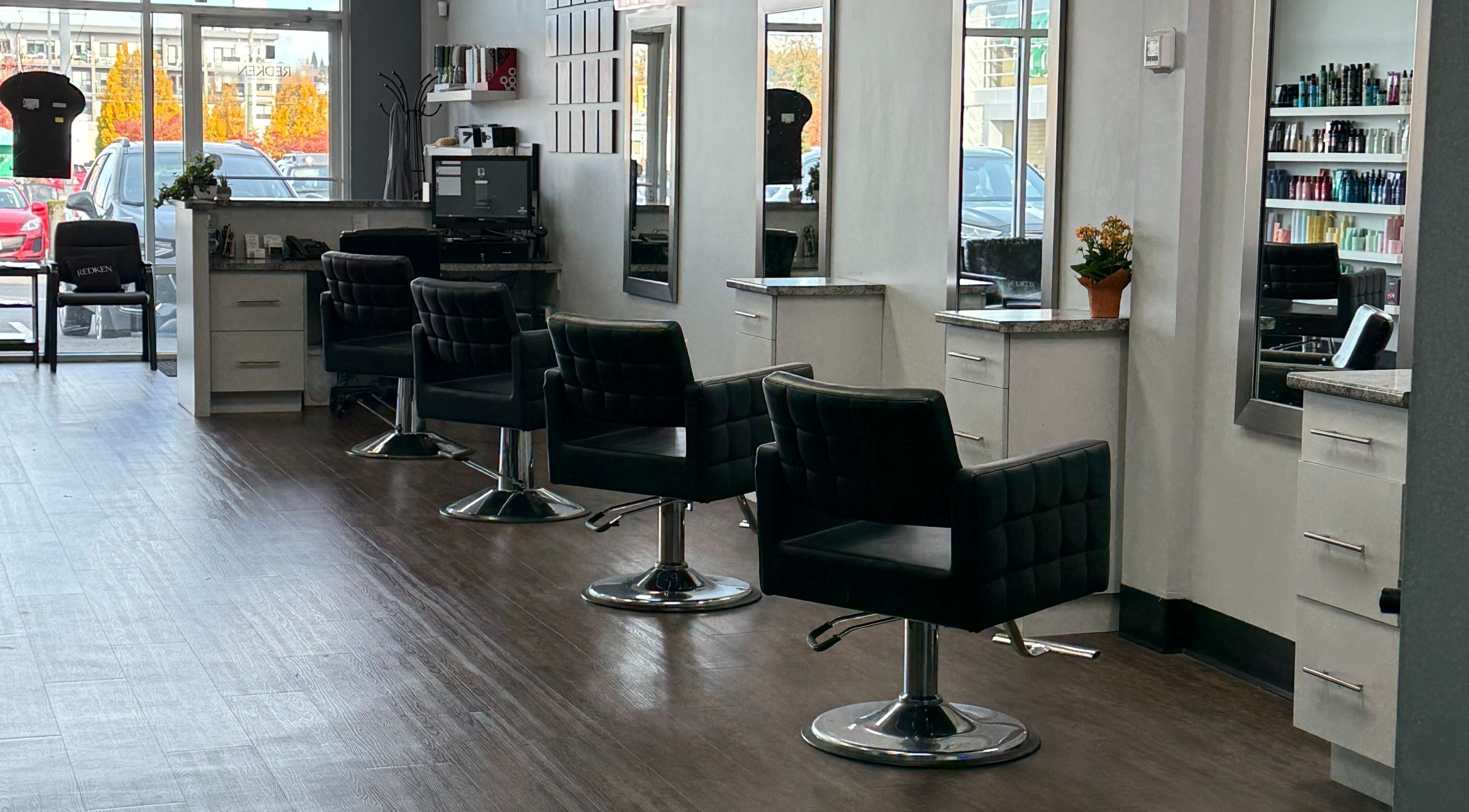 Modern salon chairs and mirrors at Custom Hair Lounge, Courtenay, BC, CA.