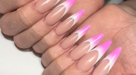 Vivid pink gradient stiletto nails at Polished Nail Bar DTLA, Los Angeles, California, US.