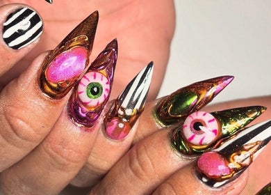 Bold nail art with vibrant, eclectic designs at Polished Nail Bar DTLA, Los Angeles, California, US.