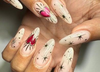 Elegant nail art with heart and stars at Polished Nail Bar DTLA, Los Angeles, California, US.