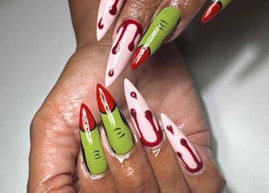 Unique nail art with green and red design at Polished Nail Bar DTLA, Los Angeles, California, US.