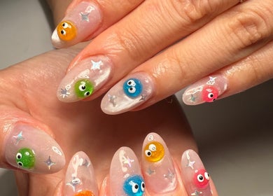 Playful nail art design with colorful blobs at Polished Nail Bar DTLA, Los Angeles, California, US.