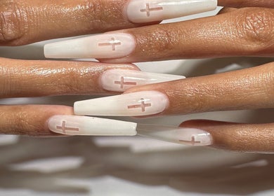 White coffin nails with cross design from Polished Nail Bar DTLA in Los Angeles, California, US.