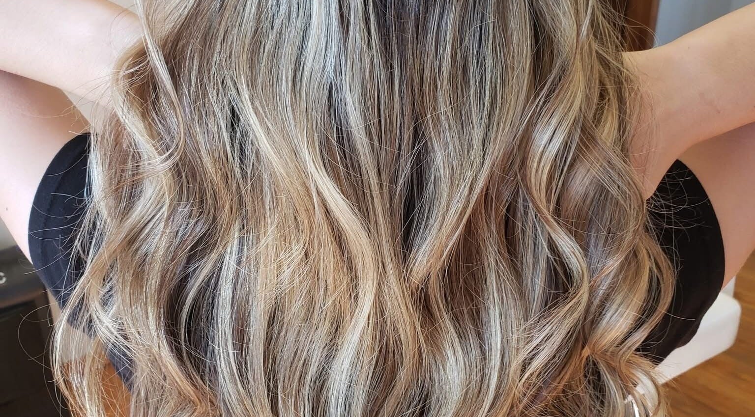 Long golden waves styled at Huckleberry and Mane, Rogersville, Missouri, US.
