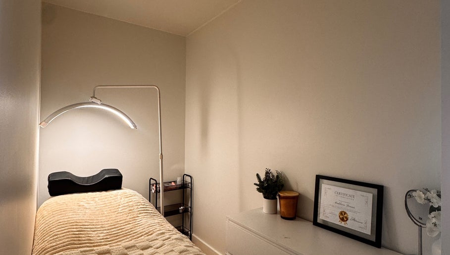 Calm treatment room at Md Lash and Beauty, Gerringong, New South Wales, AU with a therapy bed and soft lighting.