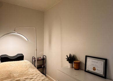 Calm treatment room at Md Lash and Beauty, Gerringong, New South Wales, AU with a therapy bed and soft lighting.
