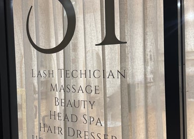 Md lash and beauty interior view featuring service list on window, Gerringong, New South Wales, AU.