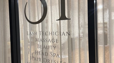 Md lash and beauty interior view featuring service list on window, Gerringong, New South Wales, AU.