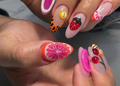 Vibrant fruit-themed nail art at MAKOKI NAILS, Zapopan, Jalisco, MX showcasing detailed design.