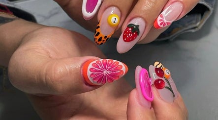 Vibrant fruit-themed nail art at MAKOKI NAILS, Zapopan, Jalisco, MX showcasing detailed design.