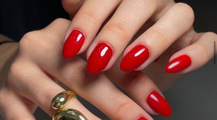 Vibrant red manicure at MAKOKI NAILS, Zapopan, Jalisco, MX showcasing exquisite nail artistry.