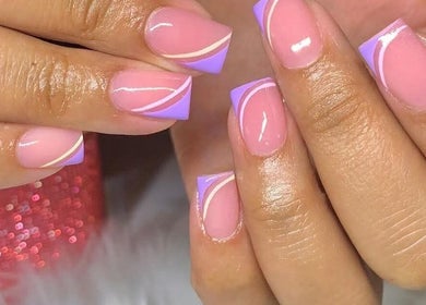 Gel nails with purple tips at Tamie beaute bar, Randburg, Gauteng, ZA. Perfect for stylish manicures.