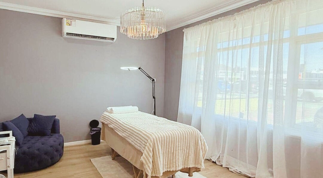 Spacious treatment room with massage bed at Maison Formé, Morley, Western Australia, AU.
