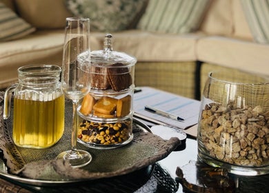 Elegant refreshment setup at Wisani Spa, Chartwell, Gauteng, ZA featuring herbal tea and snacks.