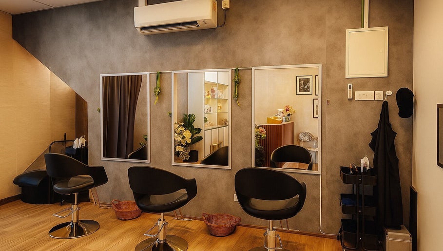Modern salon interior at Insaniah Spa & Saloon, Kepala Batas, Pulau Pinang, MY with sleek chairs and mirrors.