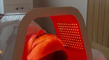 Client receiving LED light therapy at Positive Skincare, Monton, England, GB for rejuvenated skin.