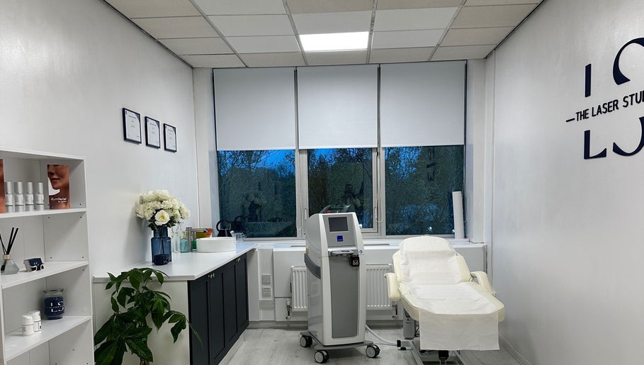 Modern treatment room at The Laser Studio EK in East Kilbride, College Milton South, Scotland, GB. Elegance and comfort.
