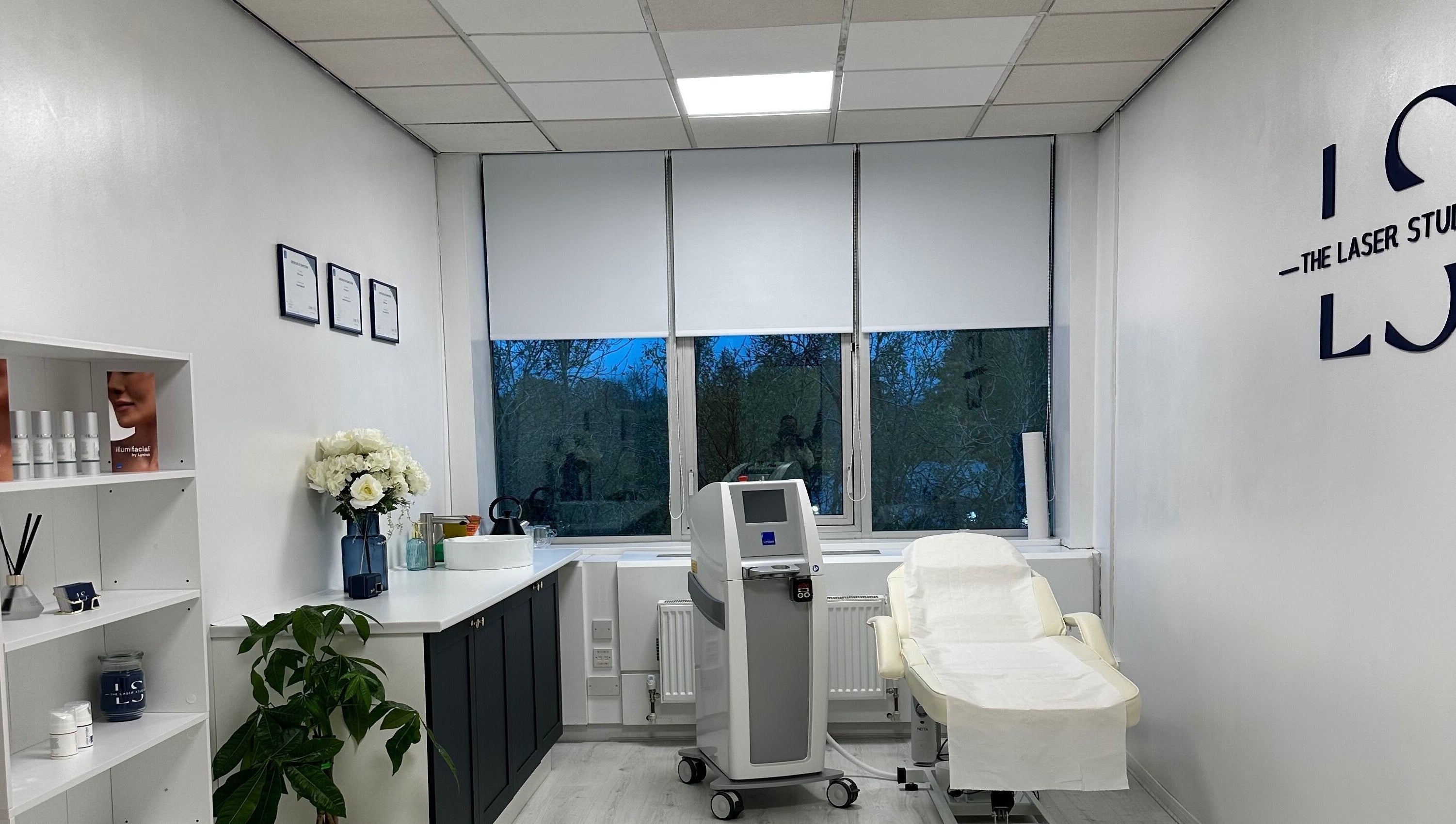 Modern treatment room at The Laser Studio EK in East Kilbride, College Milton South, Scotland, GB. Elegance and comfort.