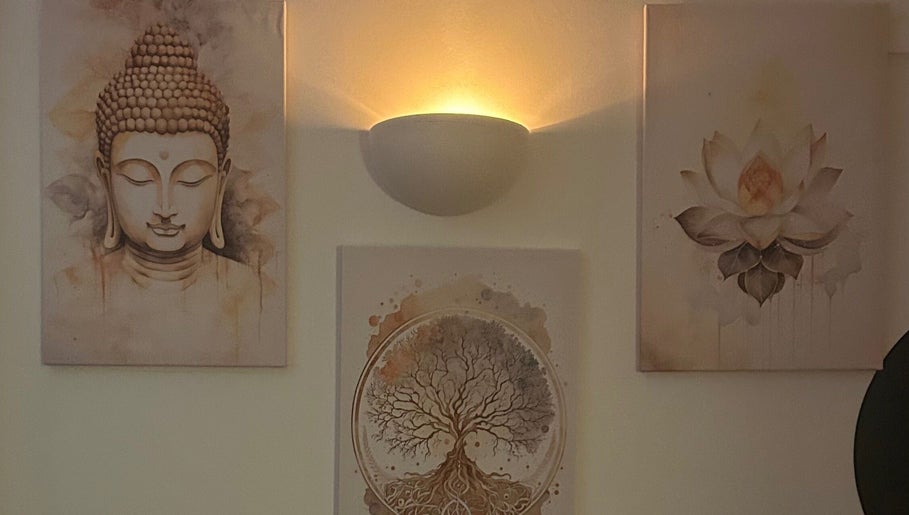 Serene wall art featuring Buddha and lotus flower at The Lux Thai Massage, Norwich, England, GB.