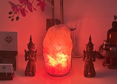 Salt lamp and Thai decor at The Lux Thai Massage, Norwich, England, GB. Warm, relaxing ambiance.