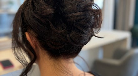 Sophisticated updo hairstyle at Leanne at cabello, Eastrington, England, GB.