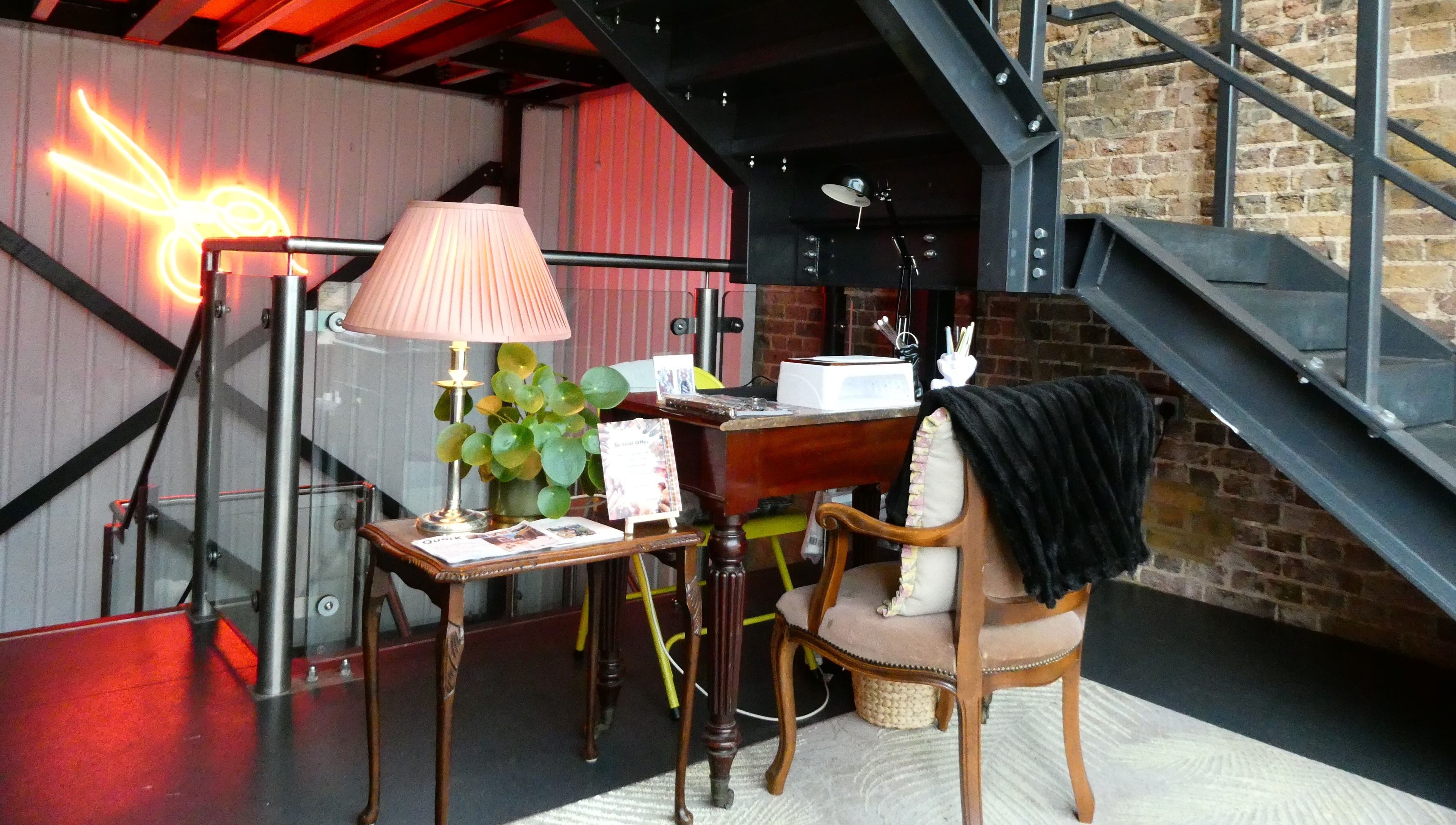 Cozy corner at Artworks96s | At Quark Hair Studio with vintage decor, London, England, GB.