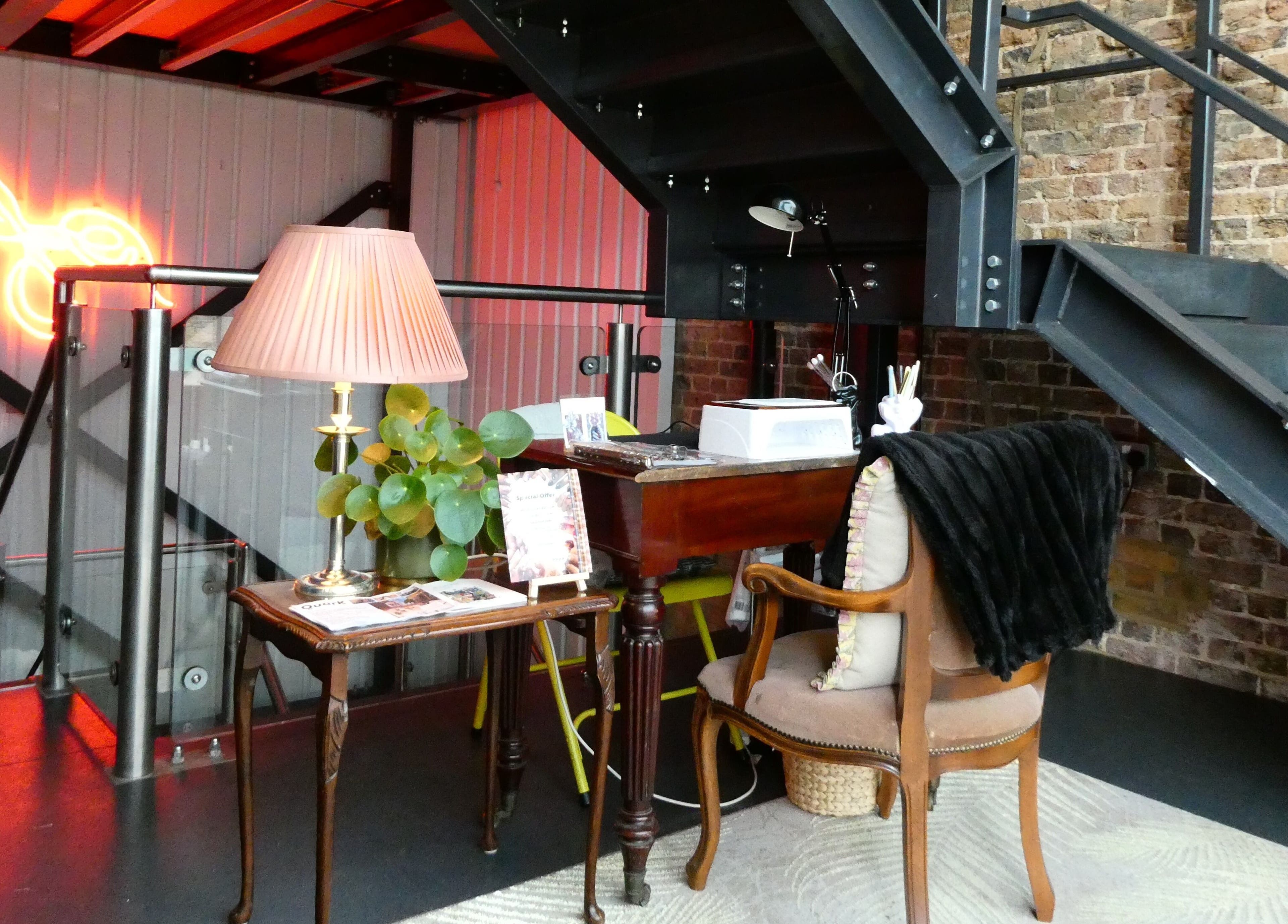 Cozy corner at Artworks96s | At Quark Hair Studio with vintage decor, London, England, GB.