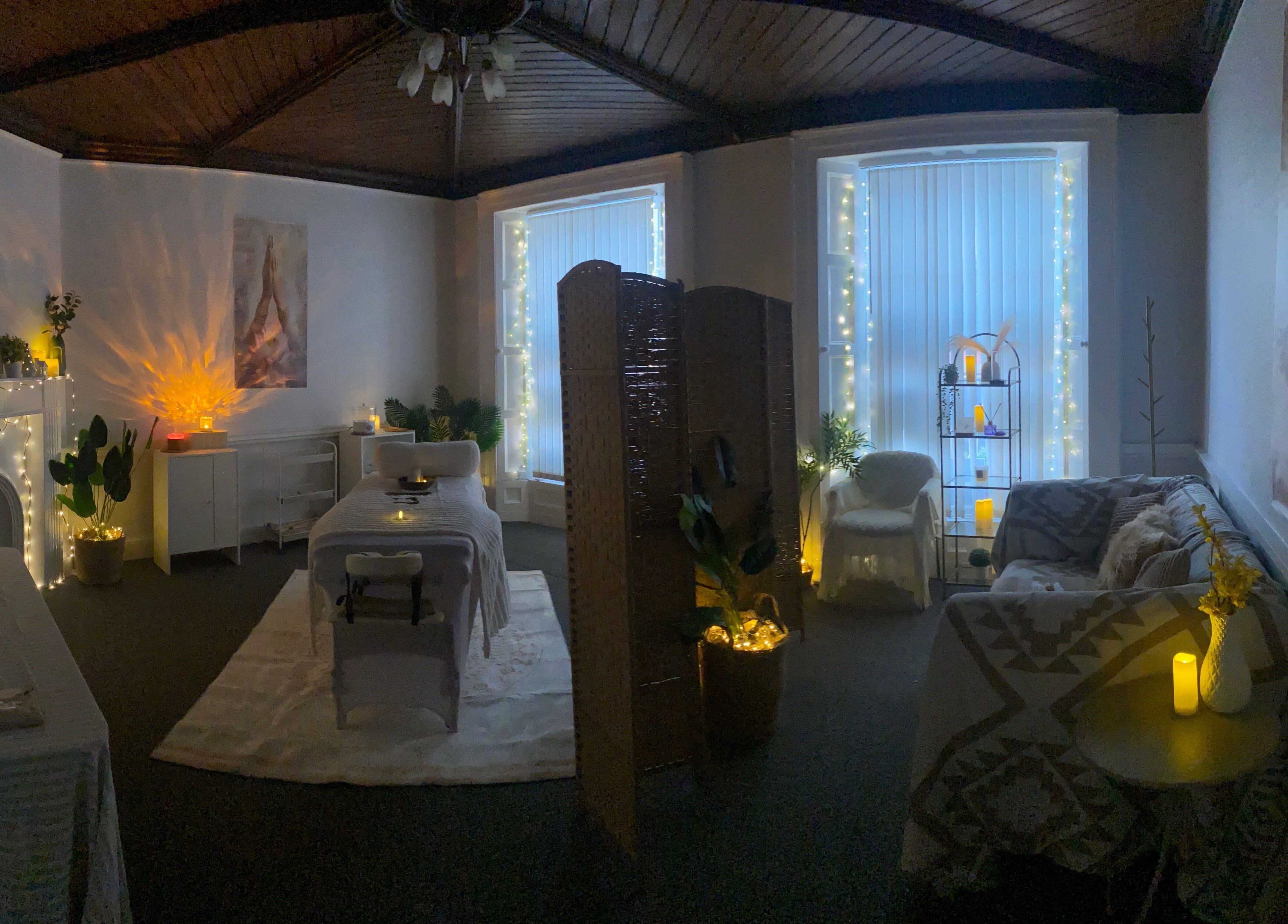 Relaxing therapy room at Alexandra in Drogheda, County Louth, IE, decorated with fairy lights and cozy seating.