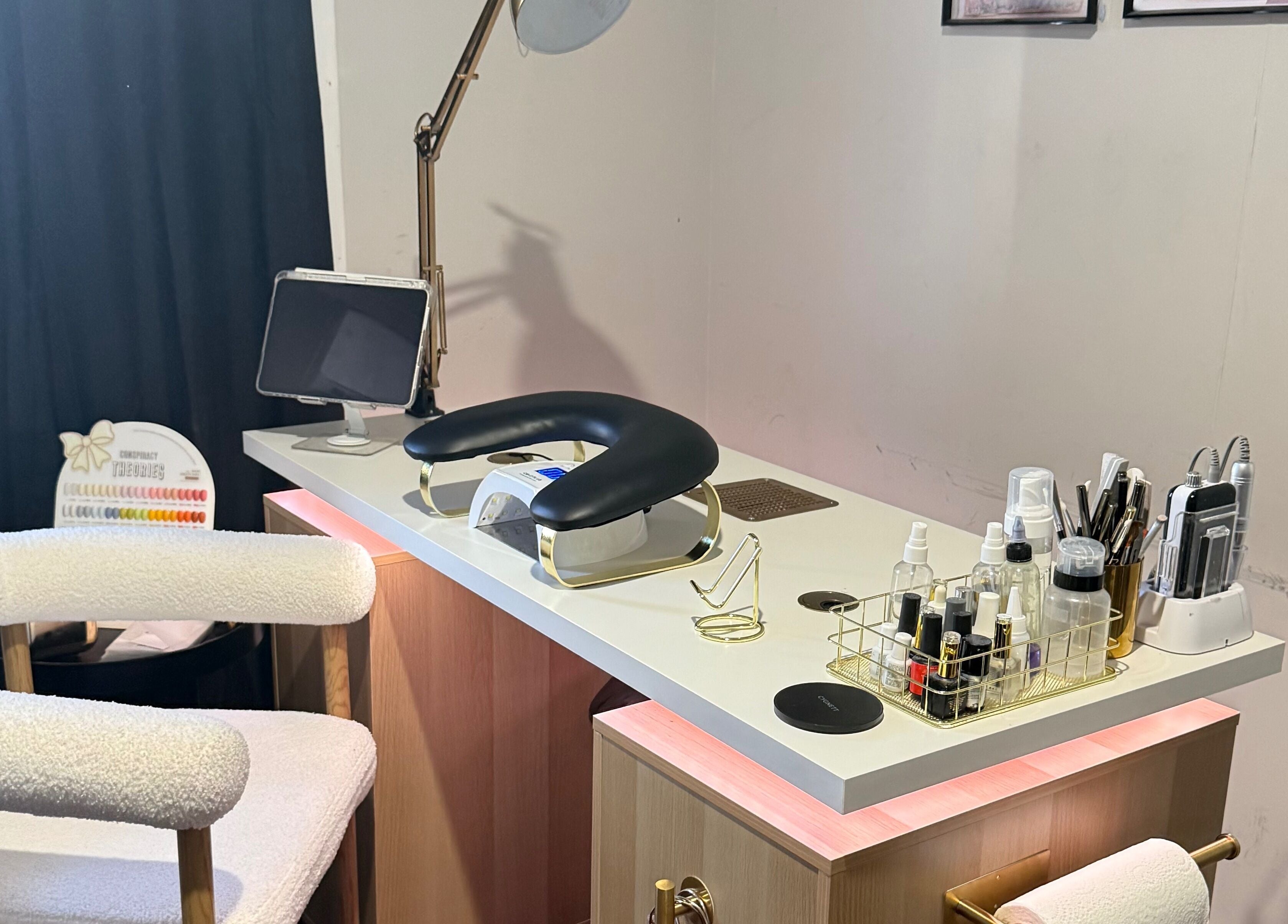Nail care station at Gals Perth, Langford, Western Australia, AU, featuring a modern setup with tools and creams.