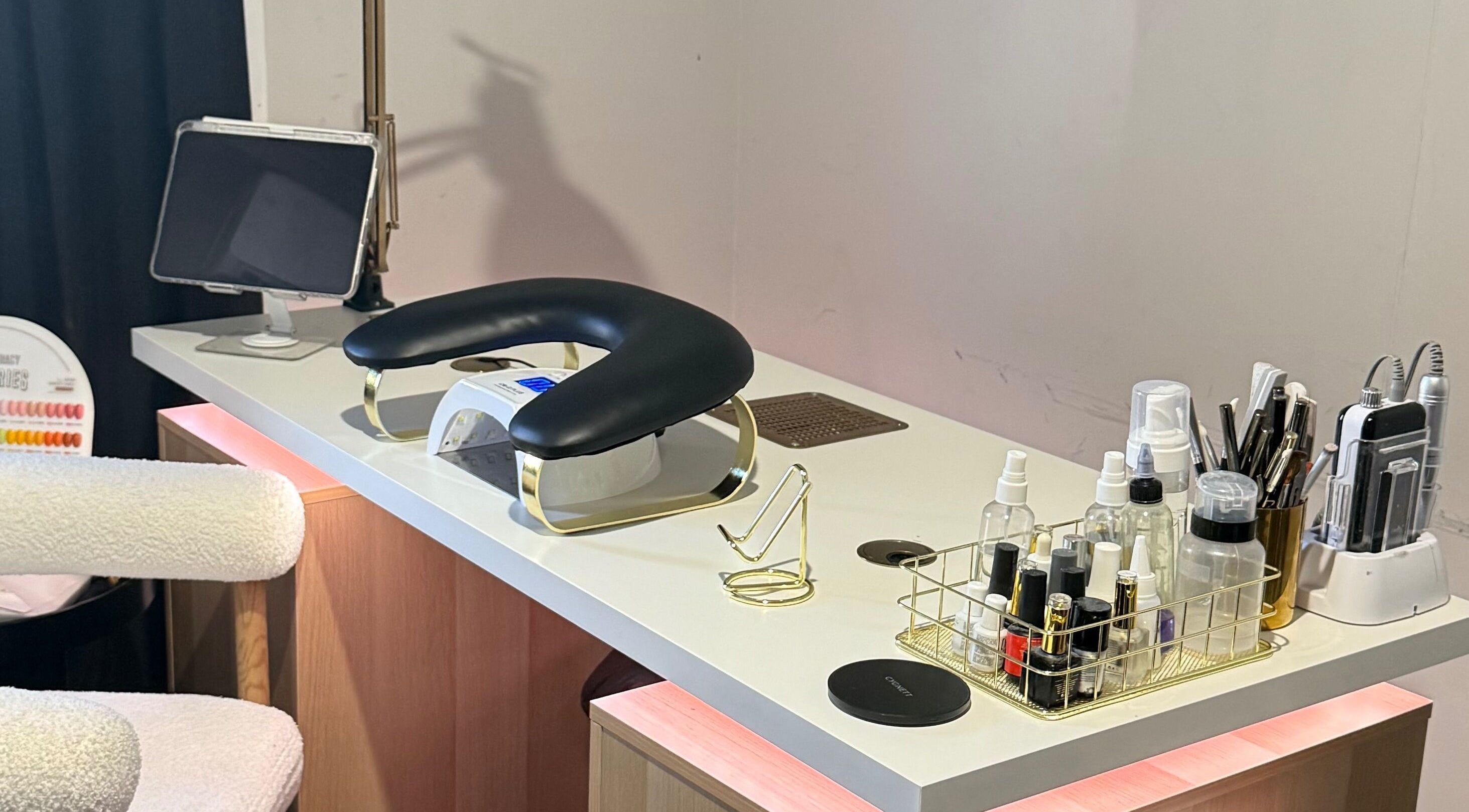 Modern beauty station at Gals Perth in Langford, Western Australia, AU with manicure tools and equipment.