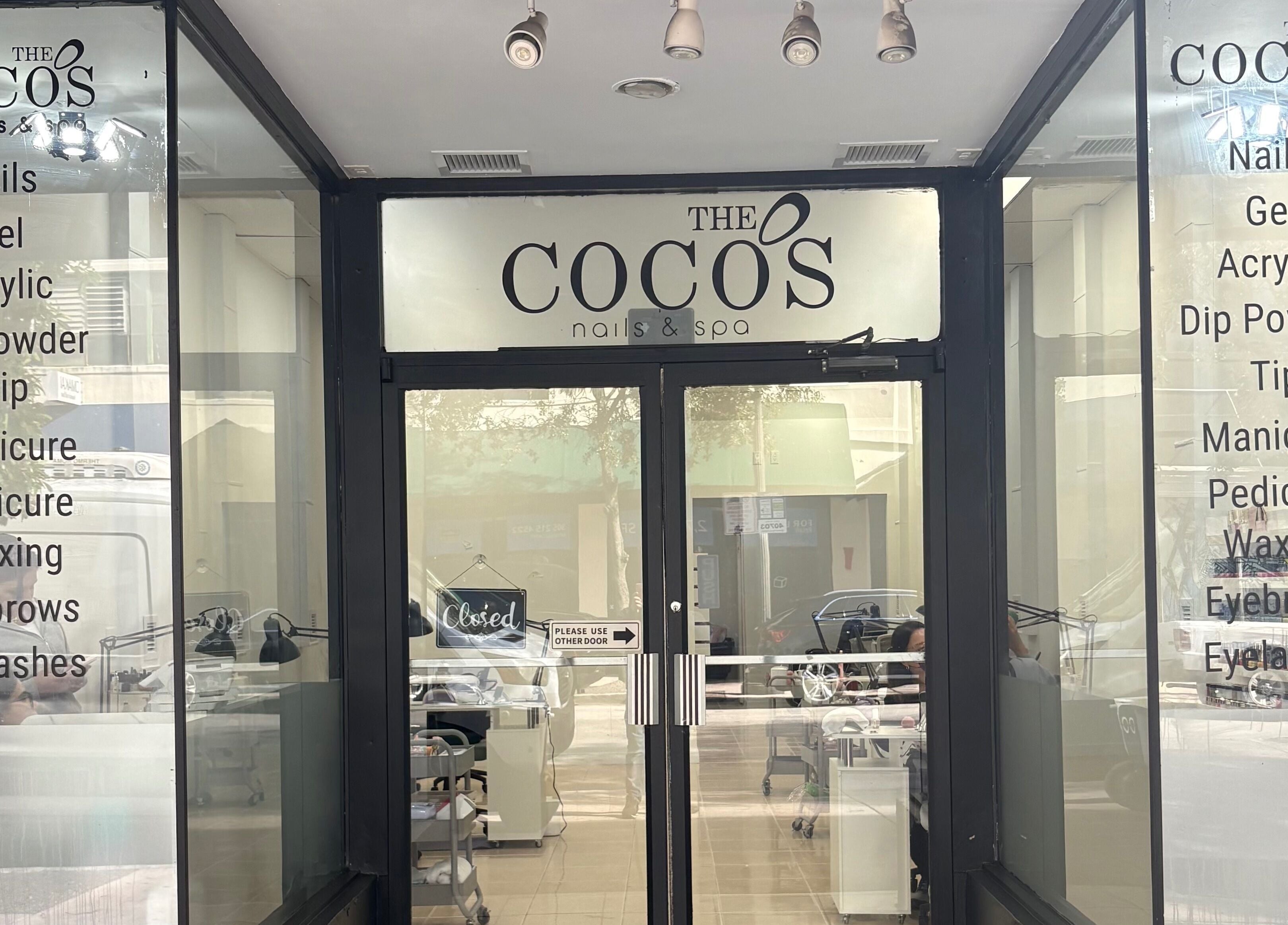 Entrance of The Coco's Nail & Spa in Miami, Florida, US offering nails, waxing, and eyelashes services.