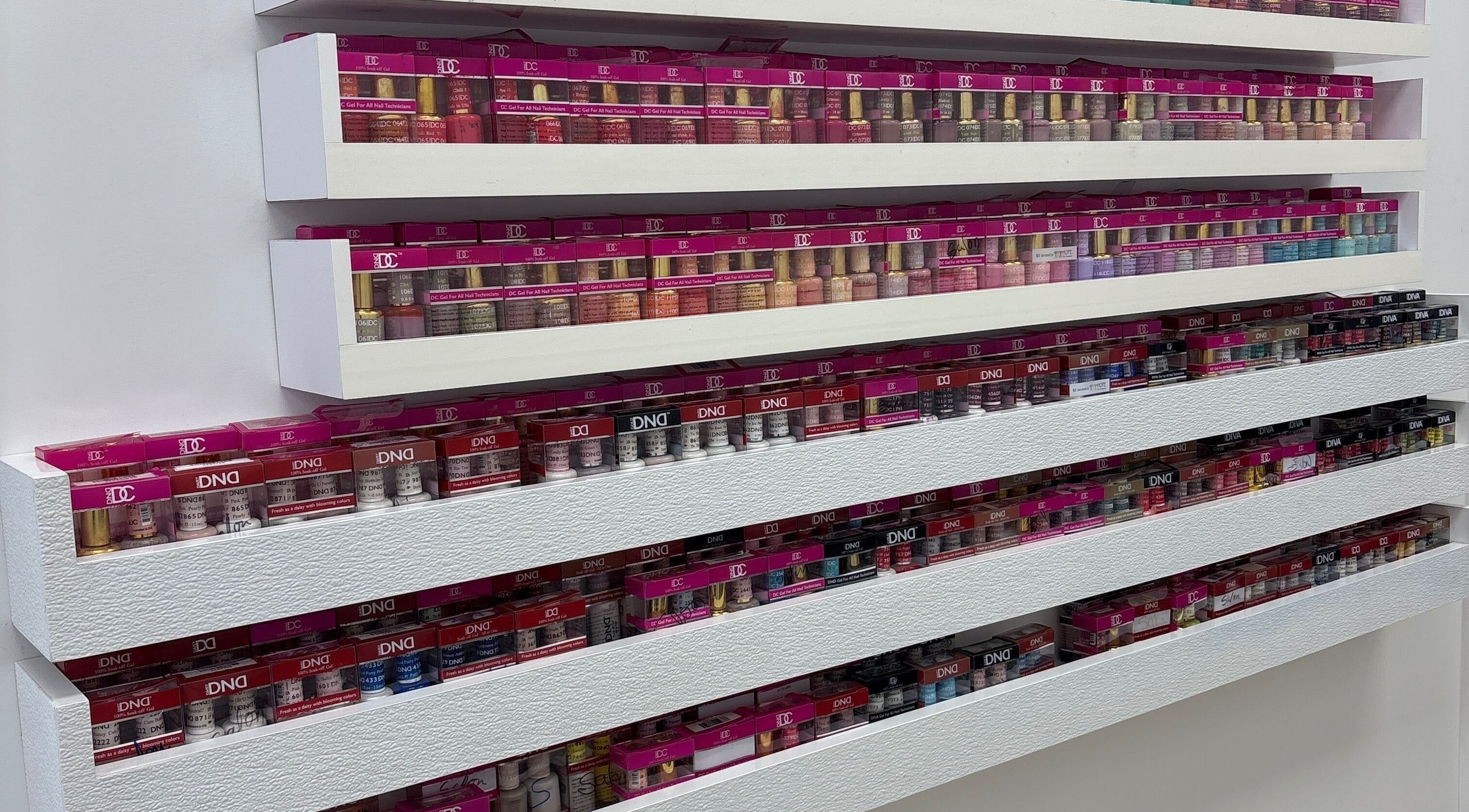 Explore the vibrant nail polish collection at The Coco's Nail & Spa in Miami, Florida, US.